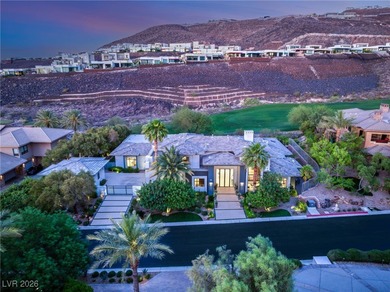 Tucked behind the gates of MacDonald Highlands, this exquisite on Dragon Ridge Country Club in Nevada - for sale on GolfHomes.com, golf home, golf lot