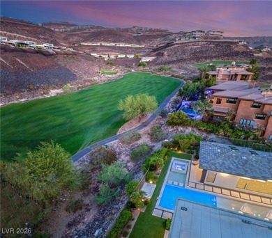 Tucked behind the gates of MacDonald Highlands, this exquisite on Dragon Ridge Country Club in Nevada - for sale on GolfHomes.com, golf home, golf lot
