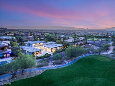 Tucked behind the gates of MacDonald Highlands, this exquisite on Dragon Ridge Country Club in Nevada - for sale on GolfHomes.com, golf home, golf lot