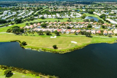 Enjoy stunning golf course & lake views from this 3BR, 21/2BA on Indian Spring Golf and Country Club in Florida - for sale on GolfHomes.com, golf home, golf lot