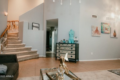 Looking for a semi-custom 2-story home located in an upscale on Dave White Reg Park and Golf Course in Arizona - for sale on GolfHomes.com, golf home, golf lot