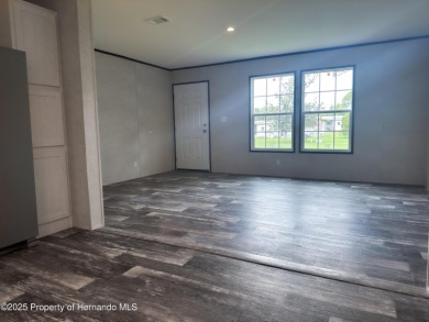 Welcome to this breathtaking, open-concept Modern home built on Brookridge Country Club in Florida - for sale on GolfHomes.com, golf home, golf lot