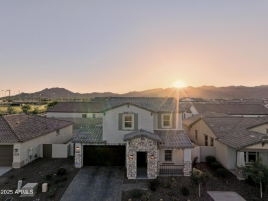 Enjoy panoramic mountain views and Phoenix skyline sunrises from on Verrado Golf Club  in Arizona - for sale on GolfHomes.com, golf home, golf lot