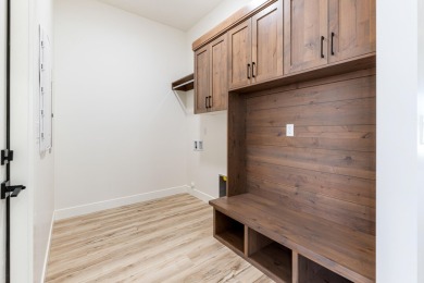 Discover pure comfort in this 4-bed, 4-bath retreat. With 2,554 on Sand Hollow Golf Resort in Utah - for sale on GolfHomes.com, golf home, golf lot