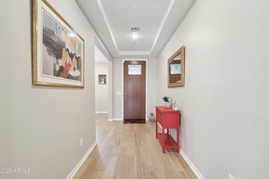Enjoy panoramic mountain views and Phoenix skyline sunrises from on Verrado Golf Club  in Arizona - for sale on GolfHomes.com, golf home, golf lot