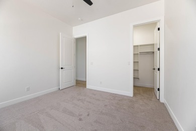 Discover pure comfort in this 4-bed, 4-bath retreat. With 2,554 on Sand Hollow Golf Resort in Utah - for sale on GolfHomes.com, golf home, golf lot