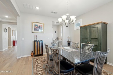 Enjoy panoramic mountain views and Phoenix skyline sunrises from on Verrado Golf Club  in Arizona - for sale on GolfHomes.com, golf home, golf lot