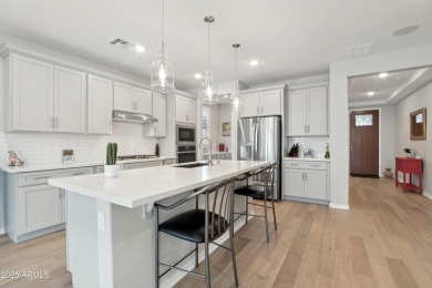 Enjoy panoramic mountain views and Phoenix skyline sunrises from on Verrado Golf Club  in Arizona - for sale on GolfHomes.com, golf home, golf lot