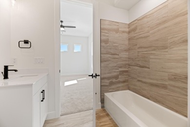 Discover pure comfort in this 4-bed, 4-bath retreat. With 2,554 on Sand Hollow Golf Resort in Utah - for sale on GolfHomes.com, golf home, golf lot