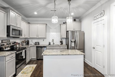 Welcome to this gorgeous 4-bedroom, 2.5-bath home in the highly on Anderson Creek Golf Club in North Carolina - for sale on GolfHomes.com, golf home, golf lot