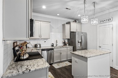 Welcome to this gorgeous 4-bedroom, 2.5-bath home in the highly on Anderson Creek Golf Club in North Carolina - for sale on GolfHomes.com, golf home, golf lot