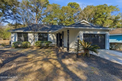 If you love the charm of mature live oaks draped in Spanish moss on Lockwood Folly Country Club in North Carolina - for sale on GolfHomes.com, golf home, golf lot