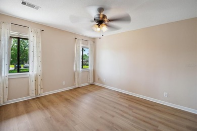 Don't miss this rare opportunity to own a light-filled on Palm Harbor Golf Club in Florida - for sale on GolfHomes.com, golf home, golf lot