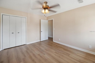 Don't miss this rare opportunity to own a light-filled on Palm Harbor Golf Club in Florida - for sale on GolfHomes.com, golf home, golf lot