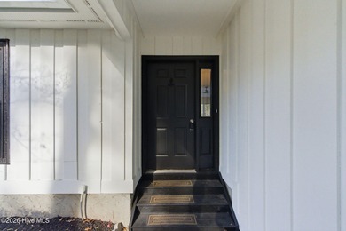 If you love the charm of mature live oaks draped in Spanish moss on Lockwood Folly Country Club in North Carolina - for sale on GolfHomes.com, golf home, golf lot