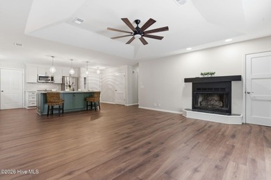 If you love the charm of mature live oaks draped in Spanish moss on Lockwood Folly Country Club in North Carolina - for sale on GolfHomes.com, golf home, golf lot