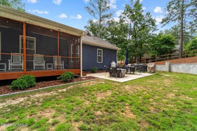 Impeccably maintained, this exquisite home resides on a tranquil on Foxfire Golf and Country Club in North Carolina - for sale on GolfHomes.com, golf home, golf lot