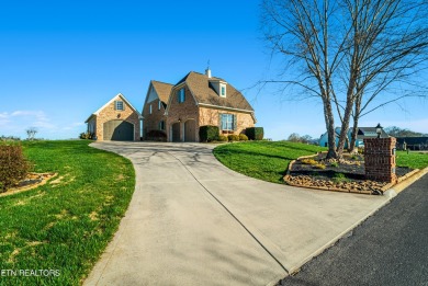 View this magnificent brick home overlooking Rarity Bay golf on Rarity Bay Country Club - Loudon in Tennessee - for sale on GolfHomes.com, golf home, golf lot