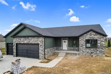 ** $10,000 BUILDER INCENTIVE FOR A BUYER UNDER CONTRACT BEFORE on Copper Ridge Golf Club in Michigan - for sale on GolfHomes.com, golf home, golf lot