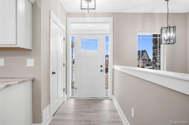 ** $10,000 BUILDER INCENTIVE FOR A BUYER UNDER CONTRACT BEFORE on Copper Ridge Golf Club in Michigan - for sale on GolfHomes.com, golf home, golf lot