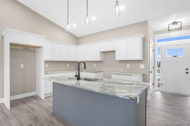 ** $10,000 BUILDER INCENTIVE FOR A BUYER UNDER CONTRACT BEFORE on Copper Ridge Golf Club in Michigan - for sale on GolfHomes.com, golf home, golf lot