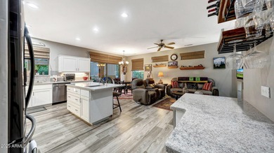 This move-in-ready home features include a stunning chef's on Sun City Grand Golf Couse and Club in Arizona - for sale on GolfHomes.com, golf home, golf lot