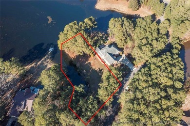 0.46 acre Waterfront Lot with stunning views and a quiet on Woodlake Country Club in North Carolina - for sale on GolfHomes.com, golf home, golf lot