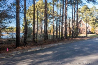0.46 acre Waterfront Lot with stunning views and a quiet on Woodlake Country Club in North Carolina - for sale on GolfHomes.com, golf home, golf lot