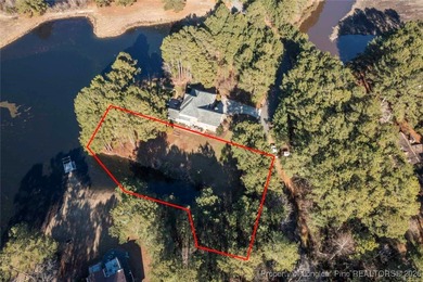 0.46 acre Waterfront Lot with stunning views and a quiet on Woodlake Country Club in North Carolina - for sale on GolfHomes.com, golf home, golf lot