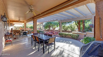 This move-in-ready home features include a stunning chef's on Sun City Grand Golf Couse and Club in Arizona - for sale on GolfHomes.com, golf home, golf lot