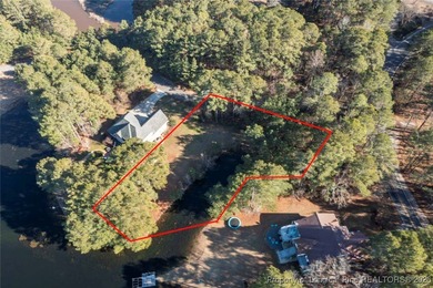 0.46 acre Waterfront Lot with stunning views and a quiet on Woodlake Country Club in North Carolina - for sale on GolfHomes.com, golf home, golf lot
