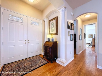 Spacious, gracious 2/2/2 + den pool home, on 14th green of on Silverthorn Country Club in Florida - for sale on GolfHomes.com, golf home, golf lot