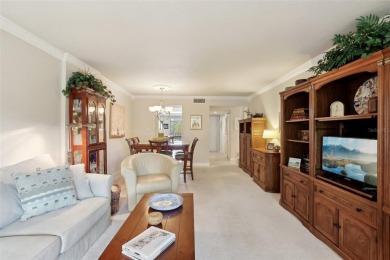 Discover refined living in this beautifully updated 2-bedroom on Cove Cay Country Club in Florida - for sale on GolfHomes.com, golf home, golf lot