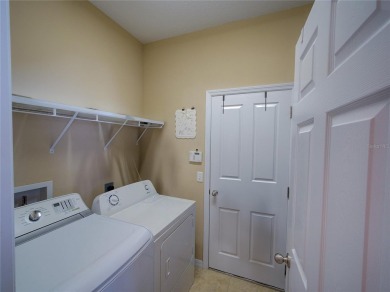 Stunning Hawthorne model by Meritage Homes offering 5 bedrooms on Providence Golf Club in Florida - for sale on GolfHomes.com, golf home, golf lot