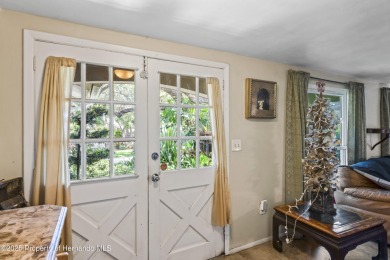 Welcome to this beautifully landscaped corner lot home located on Beacon Woods Golf Club in Florida - for sale on GolfHomes.com, golf home, golf lot