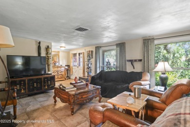 Welcome to this beautifully landscaped corner lot home located on Beacon Woods Golf Club in Florida - for sale on GolfHomes.com, golf home, golf lot