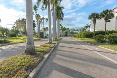 Take a look at this stunning turn-key Condo with Golf Course on Isla Del Sol Yacht and Country Club in Florida - for sale on GolfHomes.com, golf home, golf lot
