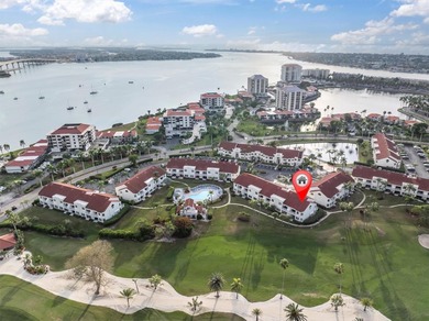 Take a look at this stunning turn-key Condo with Golf Course on Isla Del Sol Yacht and Country Club in Florida - for sale on GolfHomes.com, golf home, golf lot