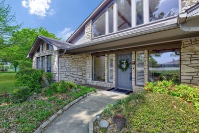 Discover serenity in this custom Stone home situated on over 1.2 on Denison Country Club in Texas - for sale on GolfHomes.com, golf home, golf lot