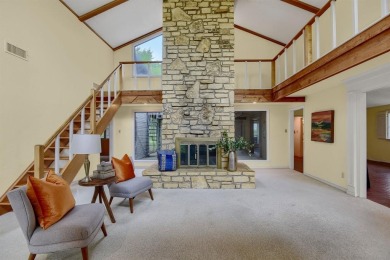 Discover serenity in this custom Stone home situated on over 1.2 on Denison Country Club in Texas - for sale on GolfHomes.com, golf home, golf lot