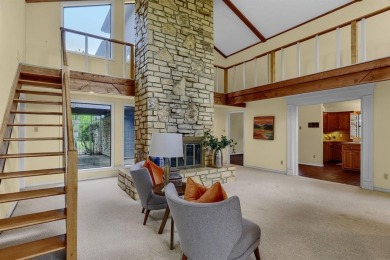 Discover serenity in this custom Stone home situated on over 1.2 on Denison Country Club in Texas - for sale on GolfHomes.com, golf home, golf lot