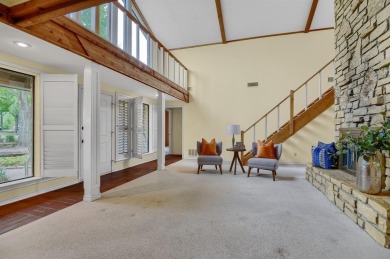 Discover serenity in this custom Stone home situated on over 1.2 on Denison Country Club in Texas - for sale on GolfHomes.com, golf home, golf lot