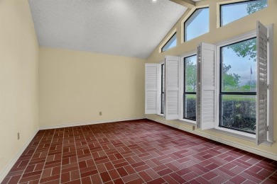 Discover serenity in this custom Stone home situated on over 1.2 on Denison Country Club in Texas - for sale on GolfHomes.com, golf home, golf lot
