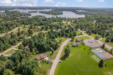 BACK ON THE MARKET! Welcome to this charming Sugar Springs home on Sugar Springs Country Club in Michigan - for sale on GolfHomes.com, golf home, golf lot