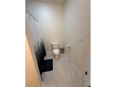 Like new 4-bedroom, 3-bath brick home in the desirable Headland on Headland Country Club in Alabama - for sale on GolfHomes.com, golf home, golf lot