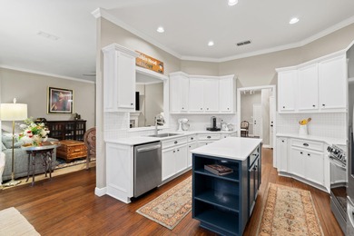 Nestled beneath a canopy of mature trees and overlooking the on Slick Rock Golf Course - Horseshoe Bay in Texas - for sale on GolfHomes.com, golf home, golf lot