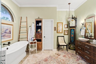 Nestled beneath a canopy of mature trees and overlooking the on Slick Rock Golf Course - Horseshoe Bay in Texas - for sale on GolfHomes.com, golf home, golf lot