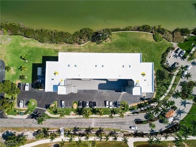 BEST PRICED Direct Bayfront fourth floor unit in the Palms of on Fort Myers Beach and Golf Club in Florida - for sale on GolfHomes.com, golf home, golf lot