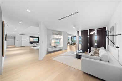 LUXURY IN MINIMALISM DESIGNED IN ELEGANT HUES OF GRAY  TAUPES IN on Fisher Island Club in Florida - for sale on GolfHomes.com, golf home, golf lot