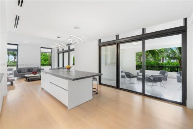 LUXURY IN MINIMALISM DESIGNED IN ELEGANT HUES OF GRAY  TAUPES IN on Fisher Island Club in Florida - for sale on GolfHomes.com, golf home, golf lot
